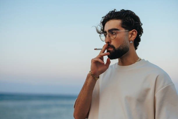 Adult smoker enjoying a cigarette outdoors in Canada