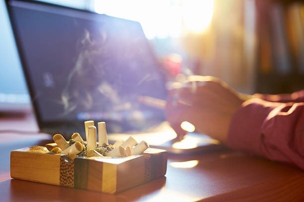 Man ordering cigarettes online from a licensed Canadian retailer