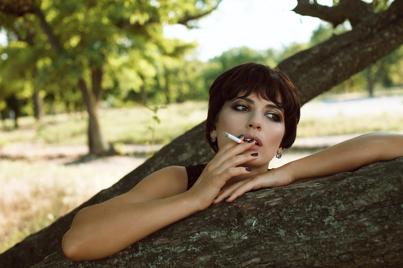 Canadian woman enjoying a cigarette outdoors in the evening