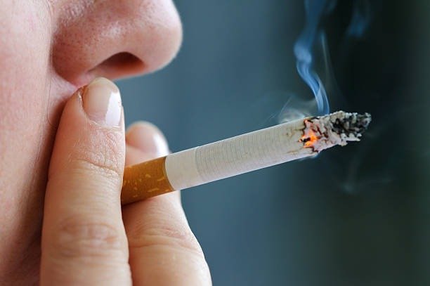 Person smoking cigarette lifestyle image